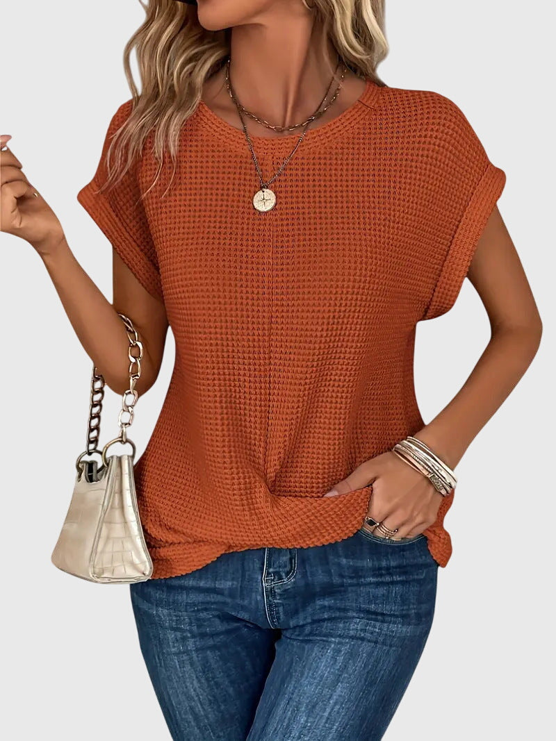 Chic women's crew neck blouse, perfect for versatile everyday wear or elegant workwear. Comfortable long sleeve top.