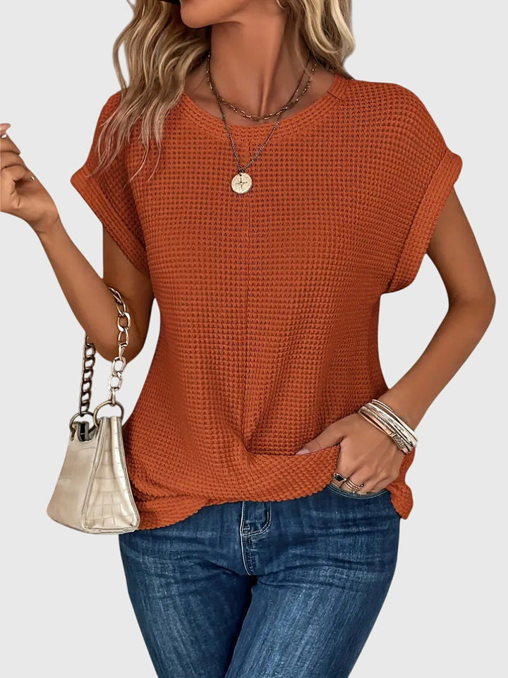 Chic women's crew neck blouse, perfect for versatile everyday wear or elegant workwear. Comfortable long sleeve top.