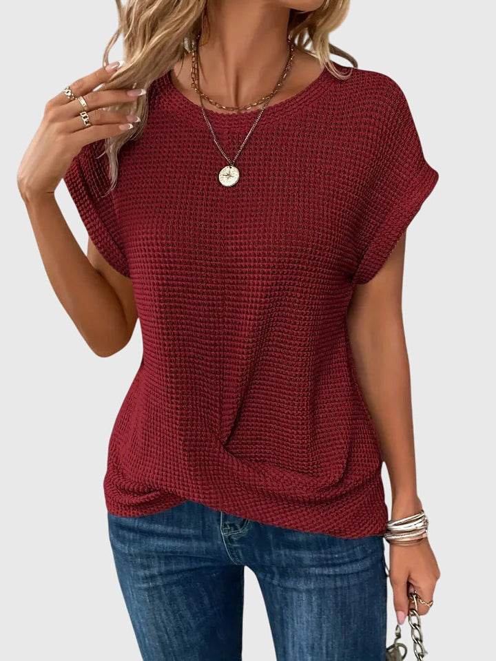 Fashionable women's crew neck blouse, a versatile long sleeve top suitable for chic casual or elegant work outfits.