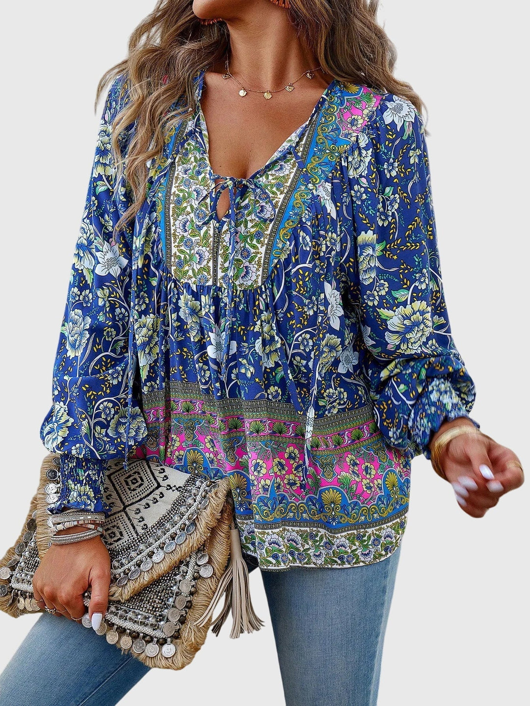 Women's elegant pullover sweater in a solid color, offering chic and comfortable long sleeve style.