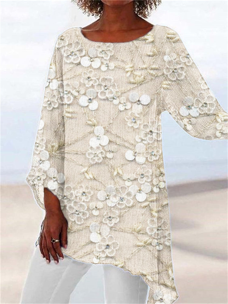 Chic women's floral tunic top with an asymmetrical hem. Long sleeve, relaxed fit for casual, everyday style.
