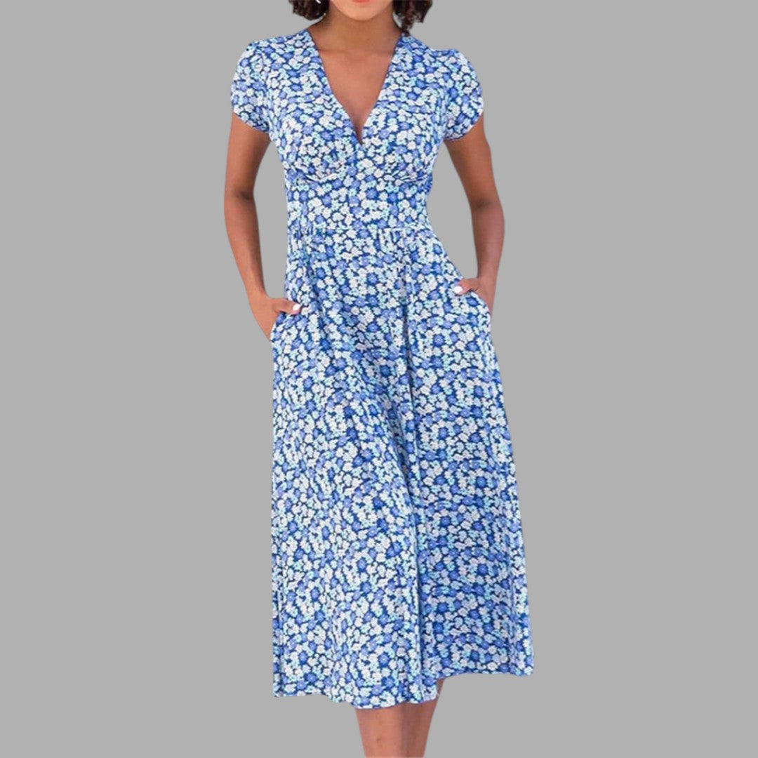 Chic women's floral V-neck midi dress with short sleeves and practical pockets, perfect for spring and summer casual wear.