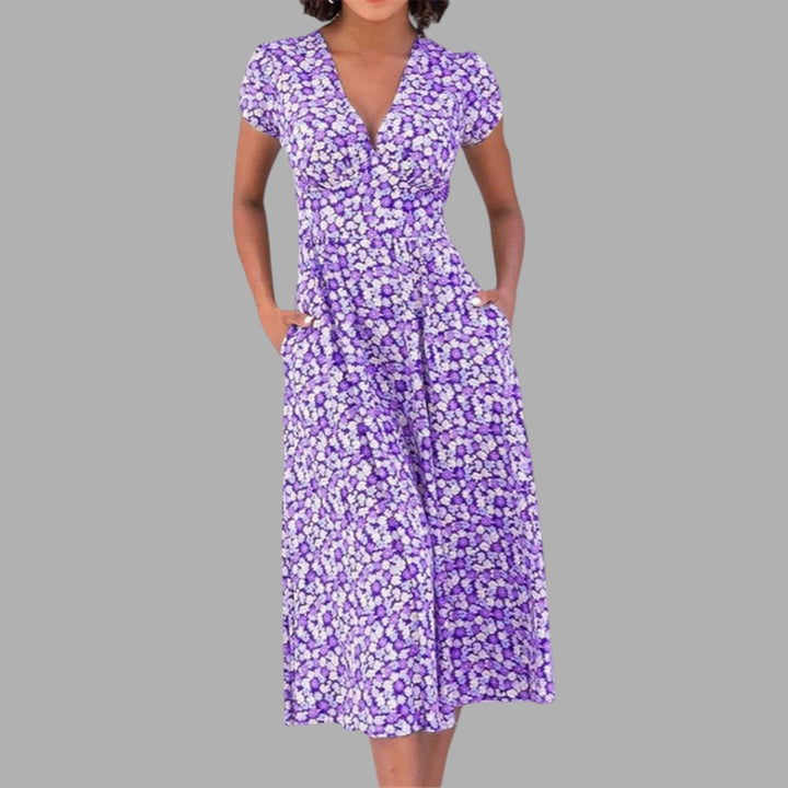 Stylish women's floral midi dress with a flattering V-neck, short sleeves, and functional pockets, great for daily wear.