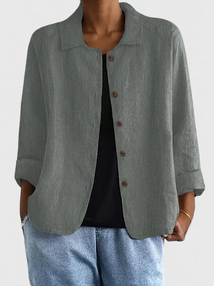 Classic women's blouse. Versatile long-sleeve top, ideal for comfortable casual outfits or office wear.