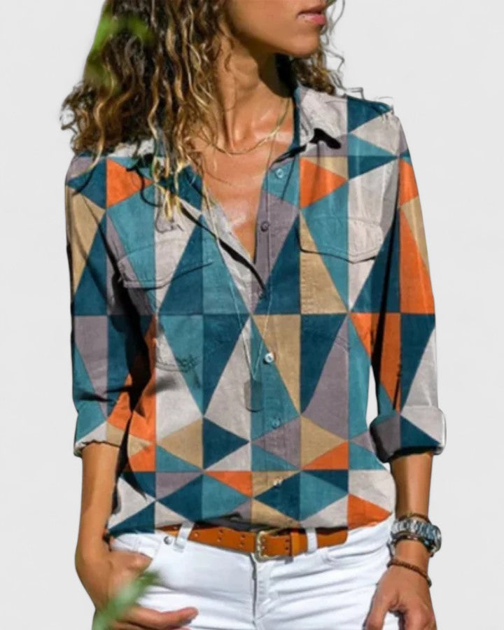 Elegant women's blouse, perfect for summer fashion. Stylish long sleeve top for a chic, versatile look.
