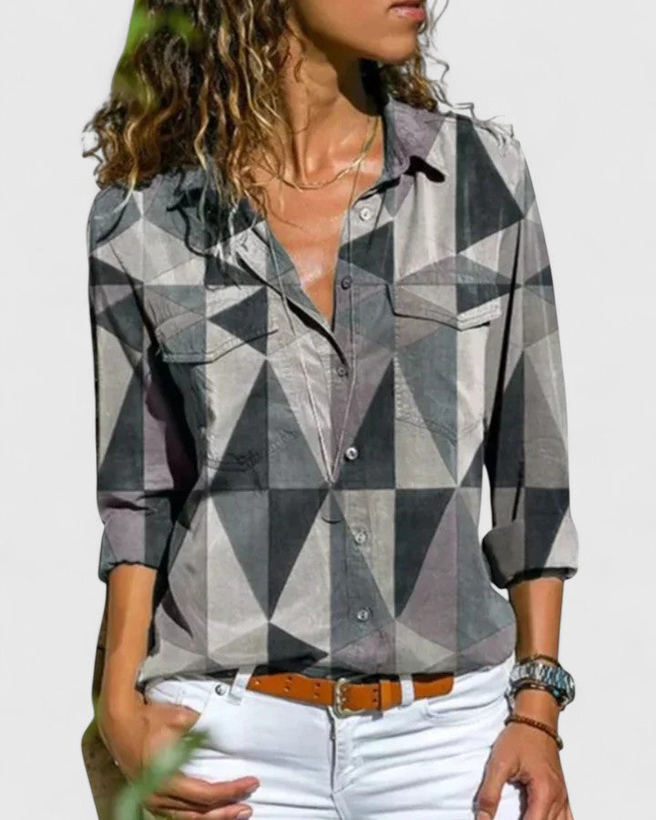 Fashionable women's long sleeve blouse, a chic and elegant top. Perfect for versatile summer and everyday styling.