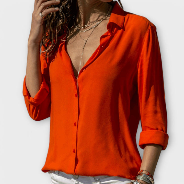 Elegant women's long sleeve blouse in a flowy fabric, ideal for stylish office wear & sophisticated evening looks.