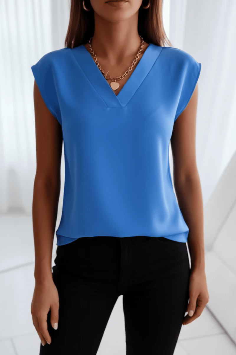 Chic women's open back going out top. Sleeveless, round neck design, perfect for stylish evening wear.