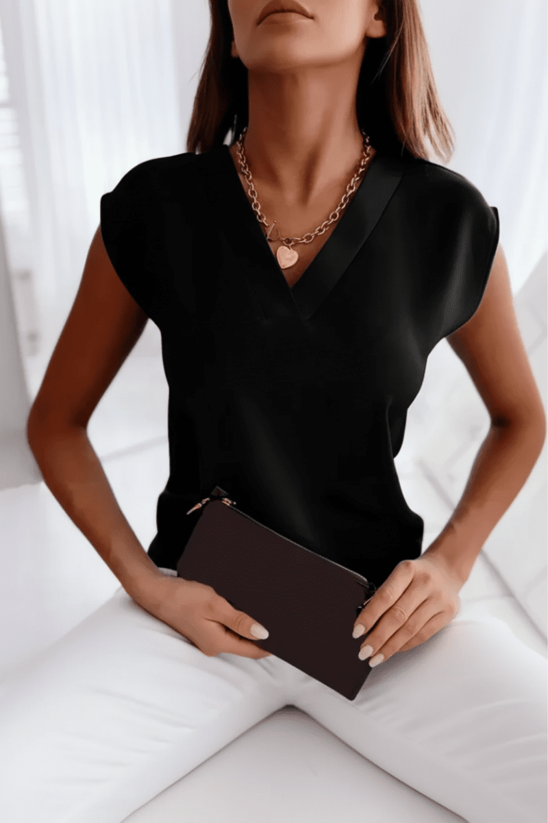 Comfortable & stylish women's open back top. Sleeveless, round neck, great for casual chic & going out.