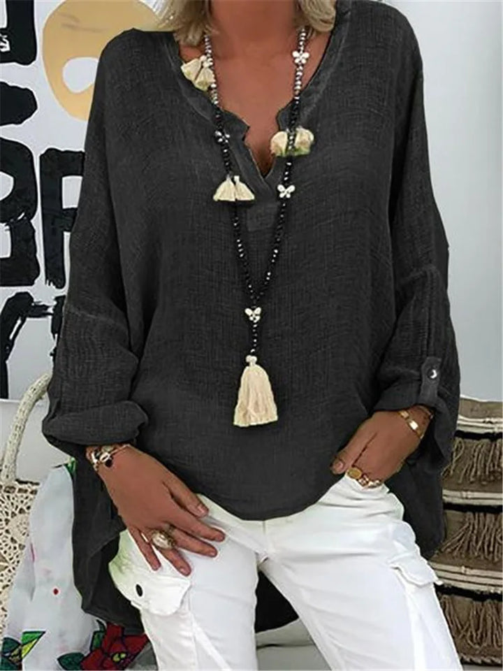 Versatile women's oversized tunic blouse, great as a summertop or beachwear. Relaxed fit for effortless casual fashion.
