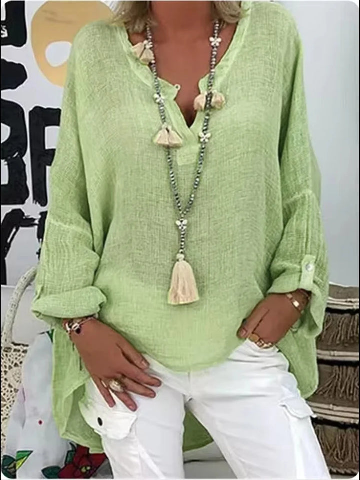 Stylish women's oversized blouse, a comfortable top with a relaxed fit. Perfect for a chic, effortless modern look.
