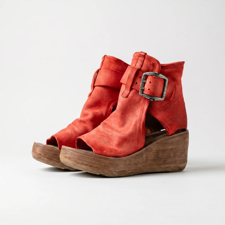 Comfortable women's peep toe platform wedge sandals with an elegant ankle strap, ideal for summer outfits.