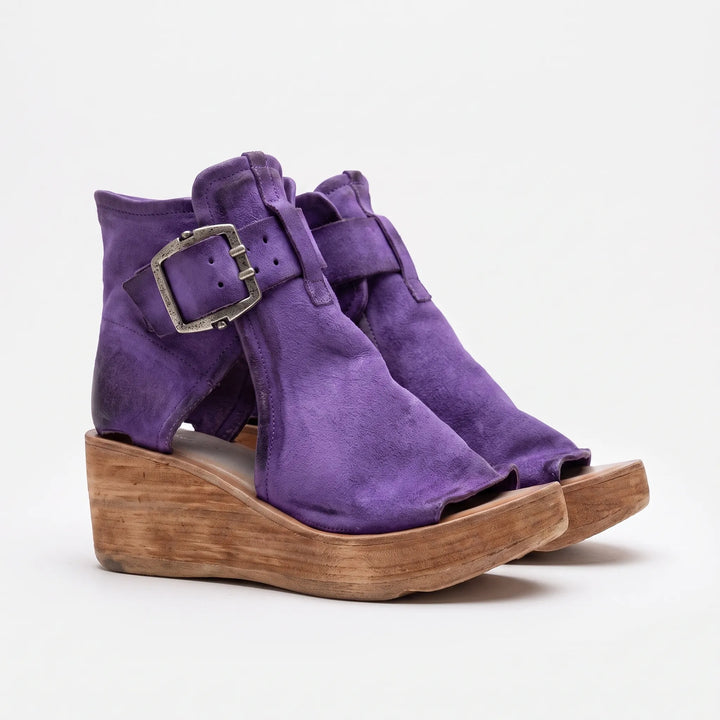 Women's chic peep toe platform wedge sandals with ankle strap, designed for comfortable, elevated summer style.