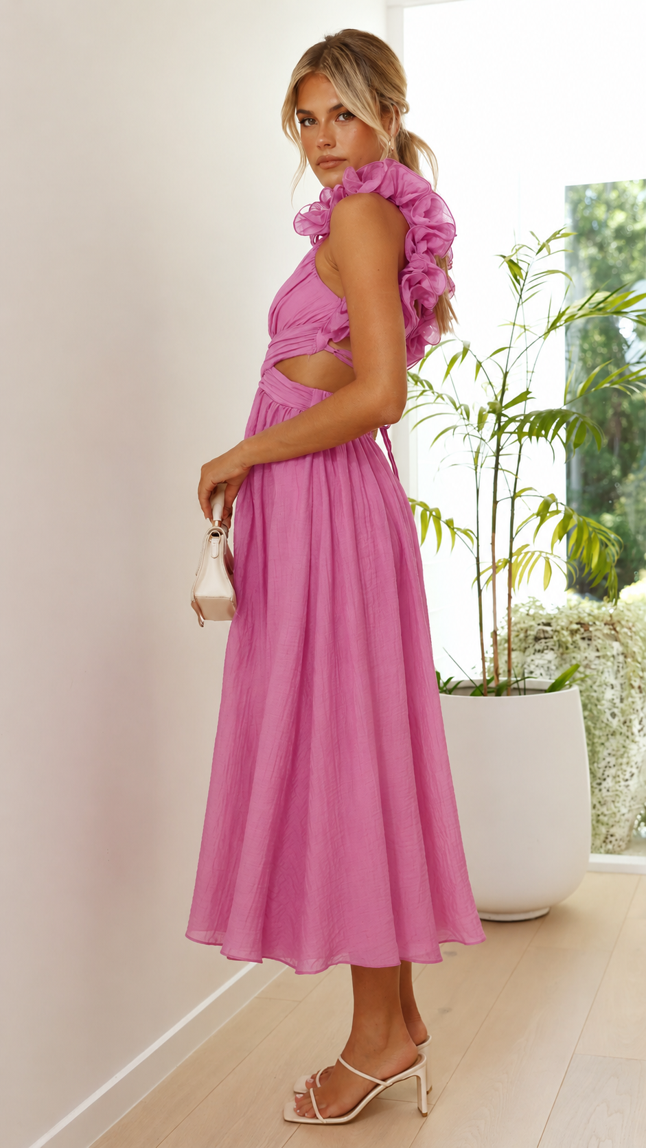 Elegant formal women's maxi dress featuring delicate ruffles and stylish lace-up back for special occasions.