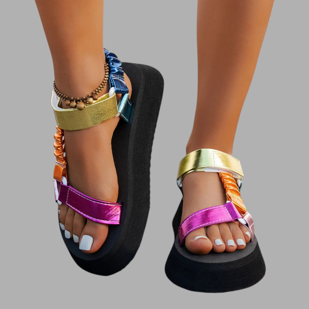 Iridescent platform sandals for women, elevating summer style with comfortable, chic heeled footwear.