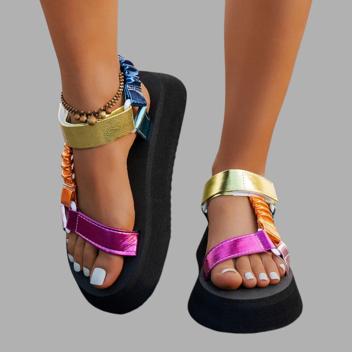 Iridescent platform sandals for women, elevating summer style with comfortable, chic heeled footwear.