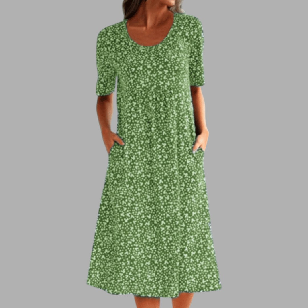 Flowy chic printed midi dress, perfect for women seeking elegant and sophisticated daytime or party wear.