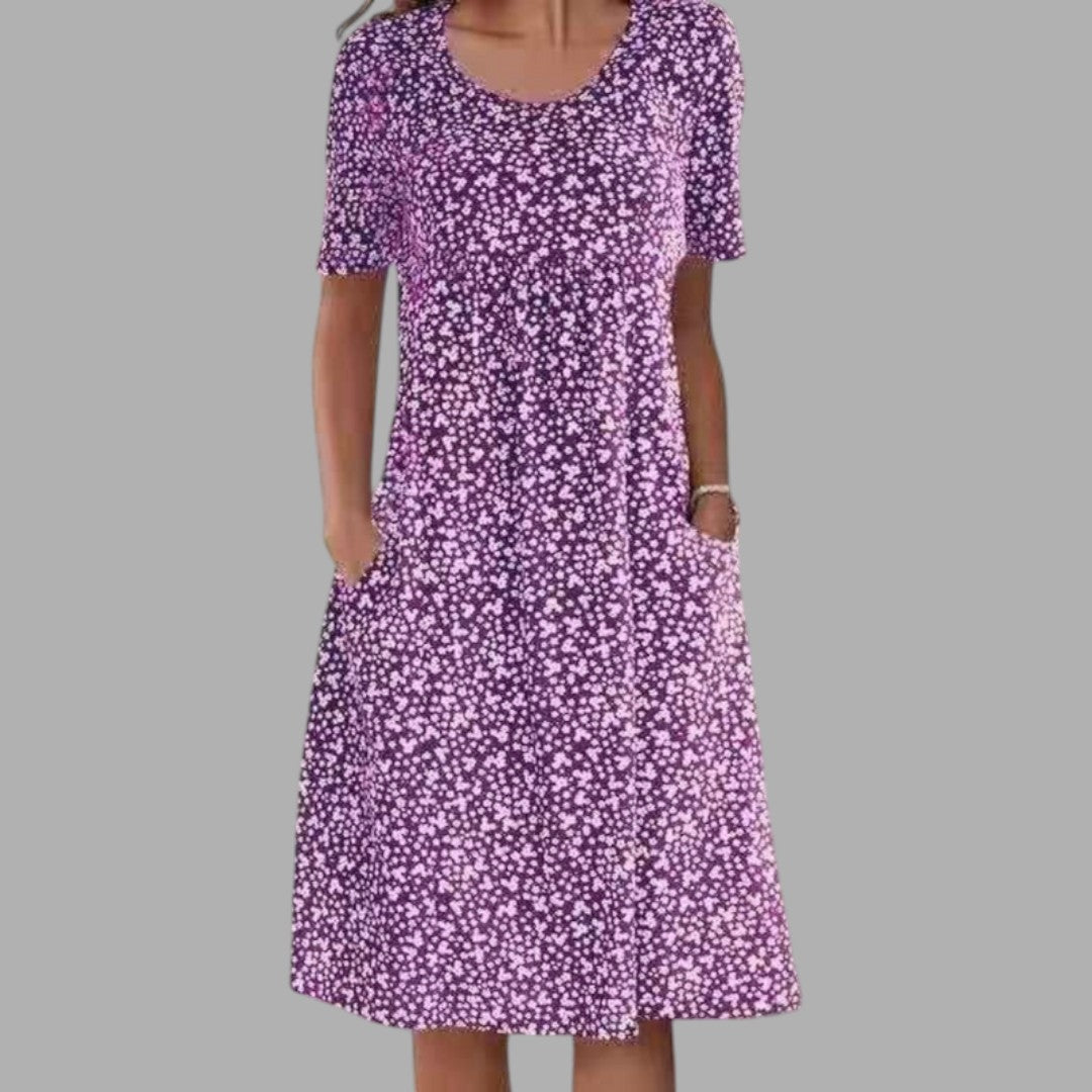 Sophisticated women's printed midi dress, combining comfort with chic elegance for a versatile wardrobe addition.