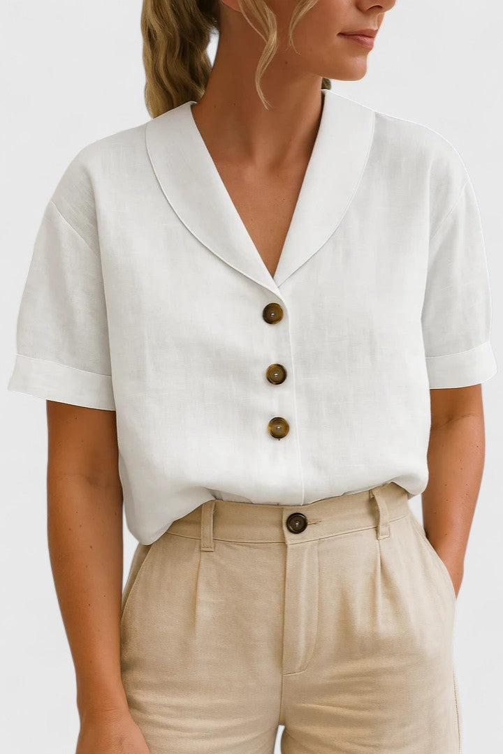Stylish women's sophisticated blouse featuring a classic button-up design. A chic and versatile top for elegant casual or professional wear.