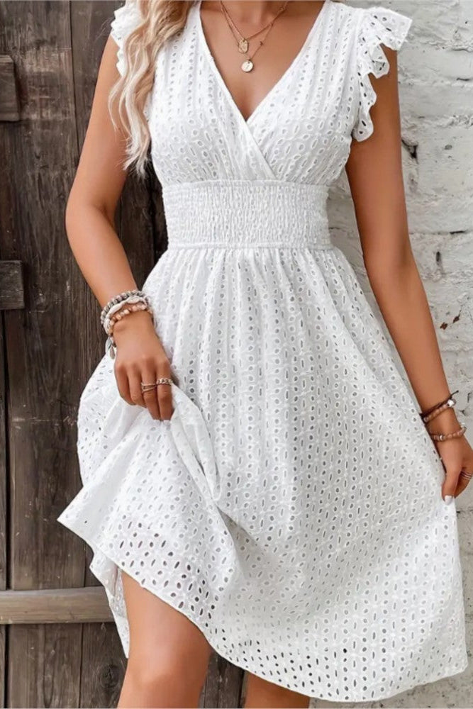 Beautiful women's strapless midi dress with unique textured pattern, a chic and elegant choice for spring & summer.