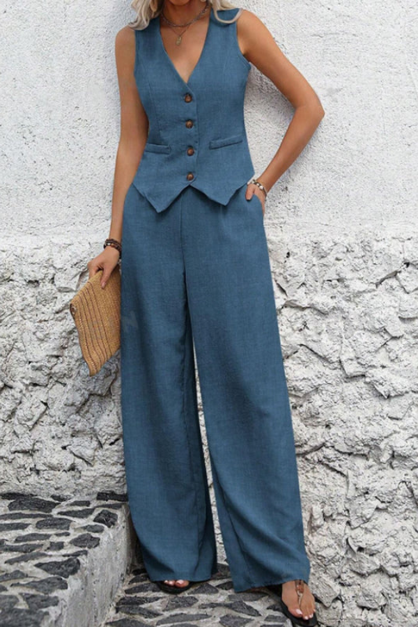 Tailored women's two-piece set: a smart vest paired with flowy wide-leg trousers for a modern look.