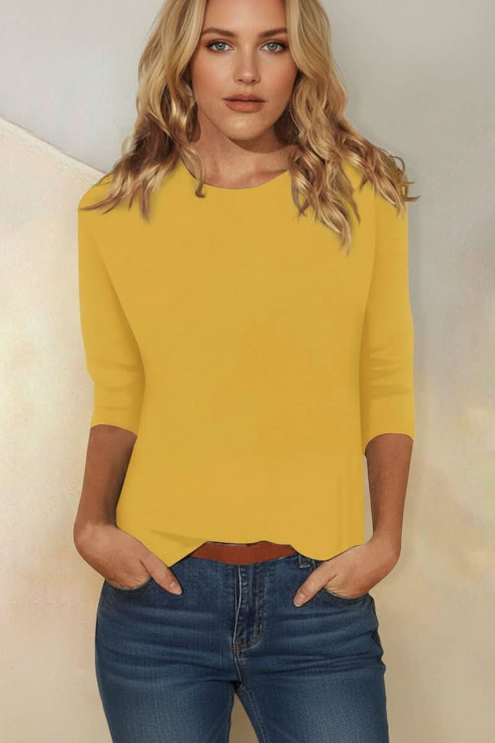 Elegant women's three-quarter sleeve blouse, ideal for evening outfits & dressy occasions. Chic summer top.