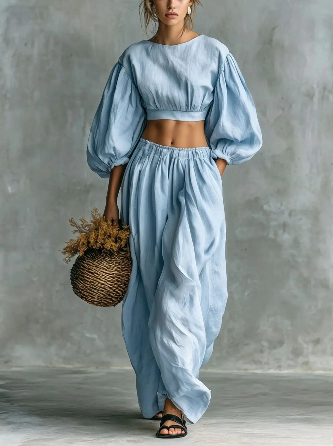 Chic women's two-piece balloon sleeve trouser set with wide-leg pants. Perfect for casual wear & vacation.