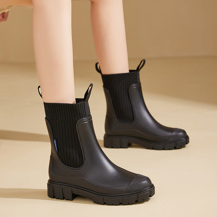 Women's anti-slip waterproof rain boots for all weather. Secure, comfortable, and chic for wet outdoor adventures.