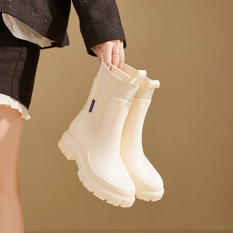 Stylish women's slip-on all-weather boots. Easy wear, waterproof comfort for urban streets & outdoor trails.