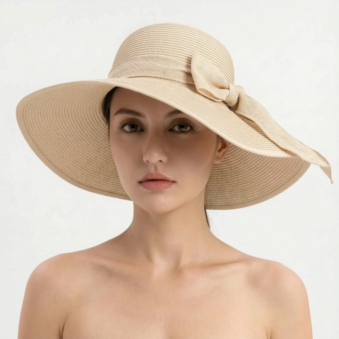 Women's chic wide brim sun hat, foldable & lightweight. Excellent for travel, beach outings, and summer fashion.