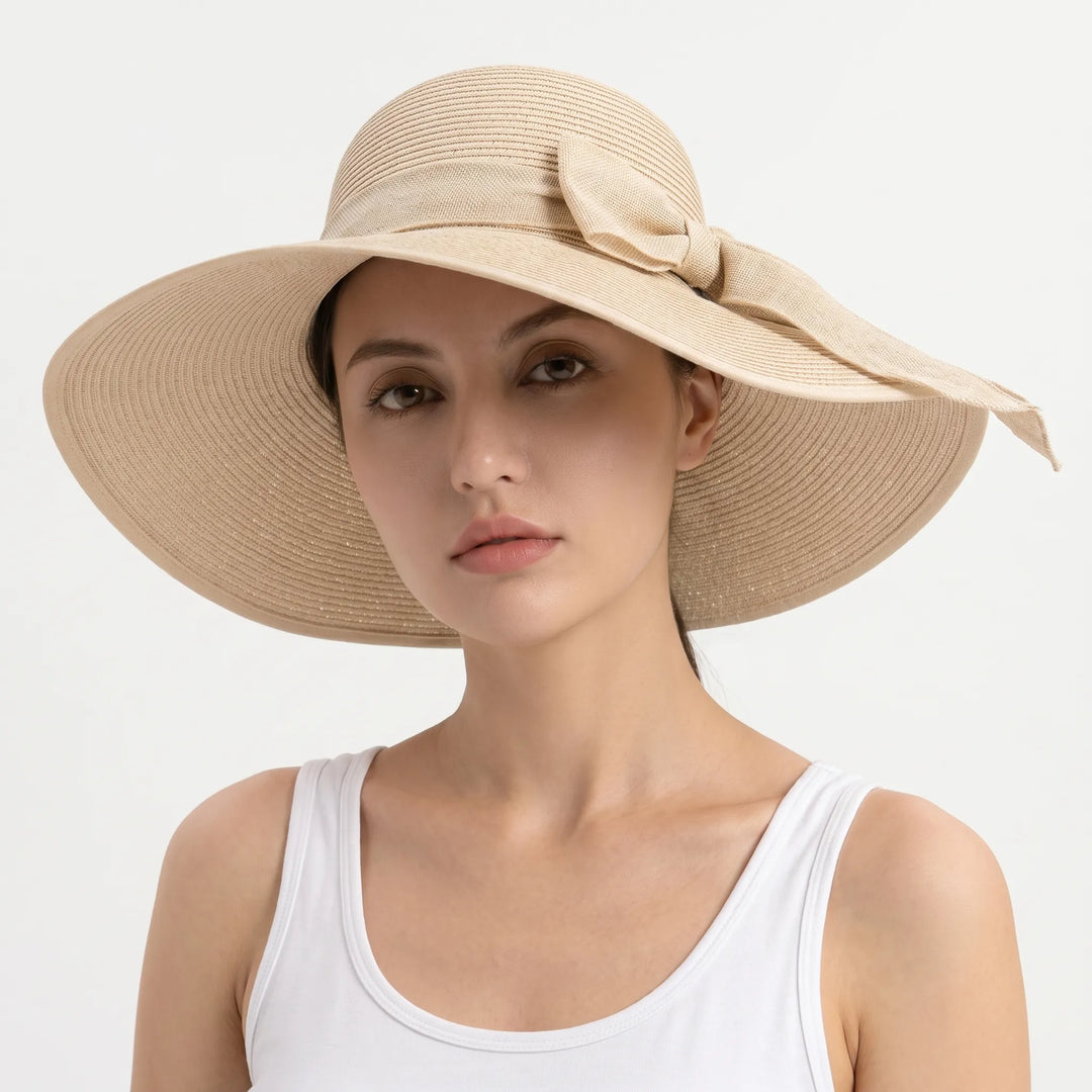 Women's foldable wide brim sun hat, offering excellent sun protection. Ideal for beach, travel, and summer.