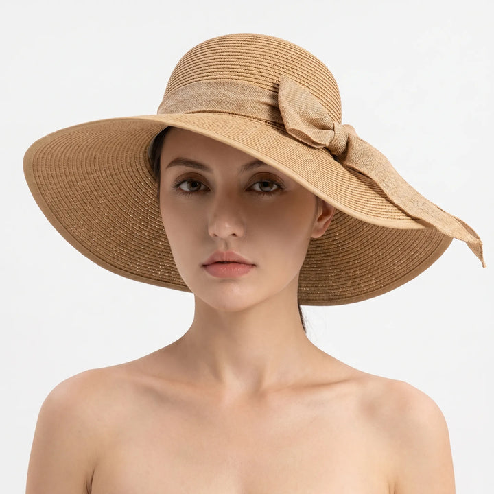 Lightweight women's wide brim sun hat, foldable for ultimate convenience. Perfect for beach and vacation.