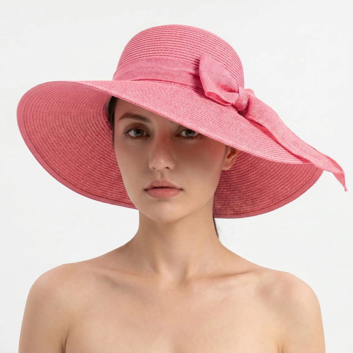 Elegant women's wide brim foldable sun hat, designed for summer style, beach days, and travel ease.