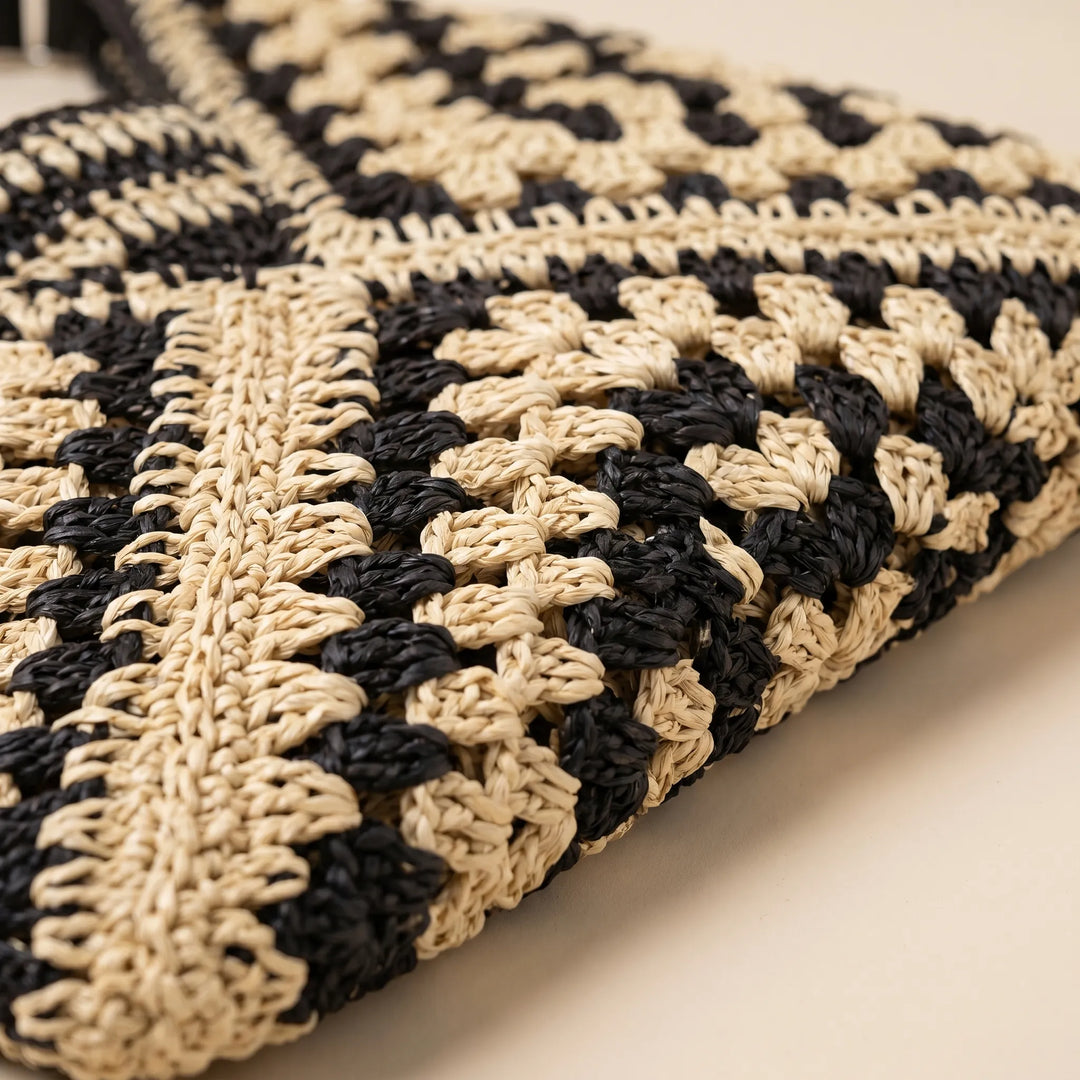 Elegant woven tote shoulder bag for women. A versatile summer accessory, ideal as a casual beach or everyday travel bag.