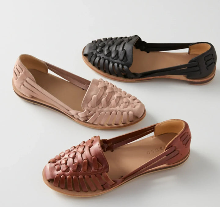 Stylish women's slip-on woven mules, designed with orthopedic features for ultimate comfort and chic summer footwear.
