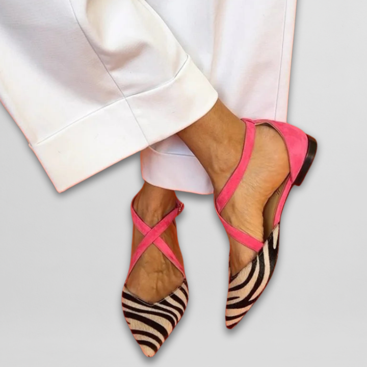 Chic women's zebra print ballerinas with strappy design, comfortable summer flats.