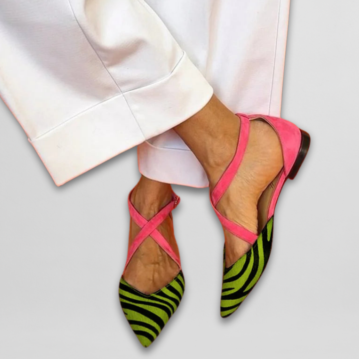 Stylish women's zebra print flats with comfortable fit & chic strappy design. Versatile summer shoes.