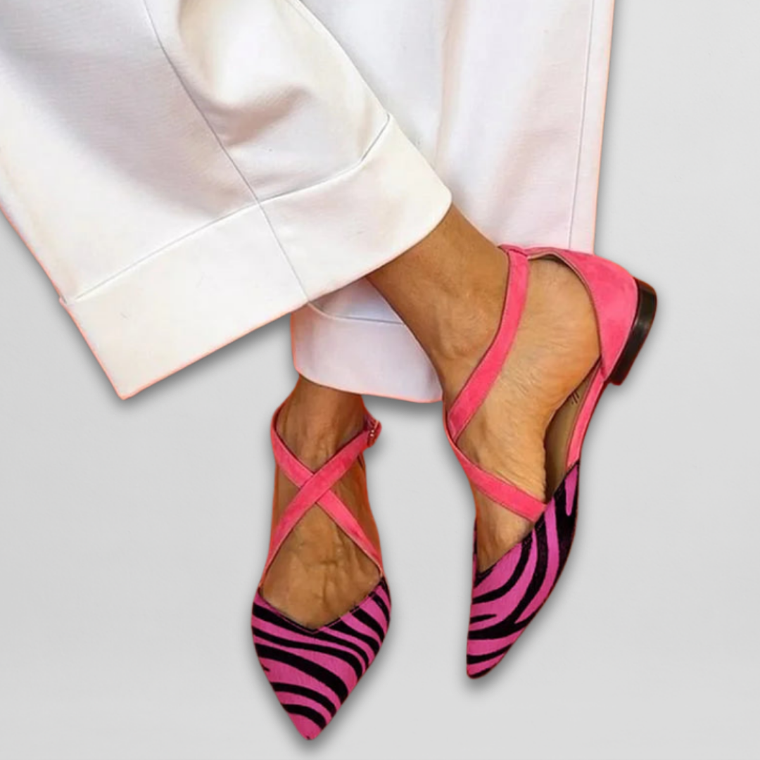 Trendy women's zebra print ballerinas. Strappy flats for chic, comfortable summer fashion.