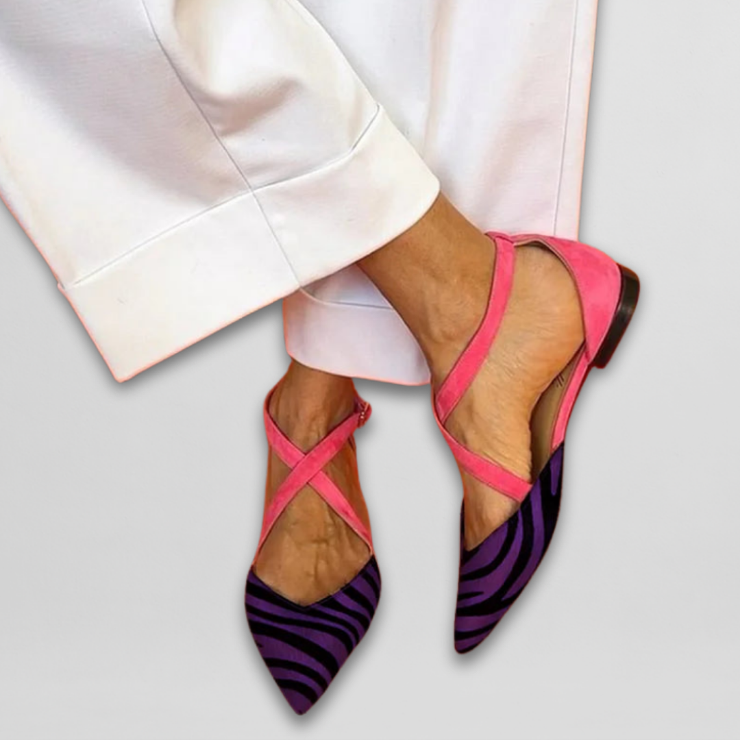Elegant women's zebra print ballerinas with stylish straps. Chic, comfortable flats for versatile summer looks.