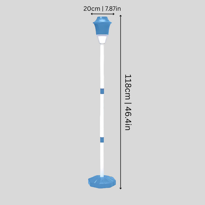 Close-up of the Kids' Automatic Light-Up Bubble Maker Toy in blue, creating a stream of glowing bubbles outdoors