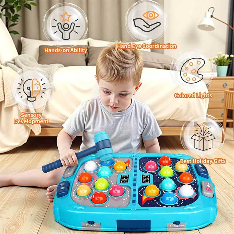 Close-up of a child's hand hitting a mole on a Whack-A-Mole game, fun & educational activity toy.