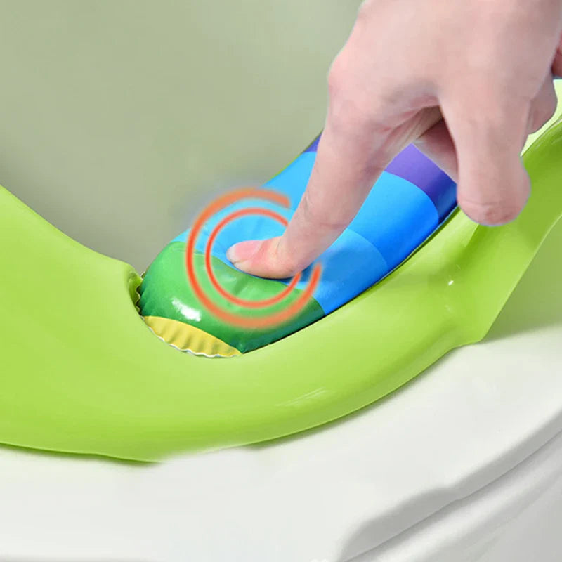 Blue cushioned potty seat for children, portable and lightweight, a helpful bathroom accessory for kids