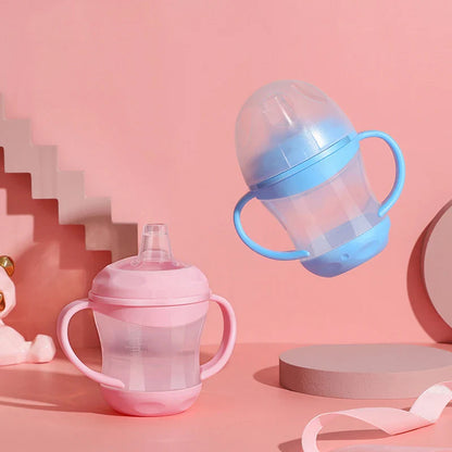 Portable infant feeding bottle, pink, with a durable handle and leakproof silicone spout
