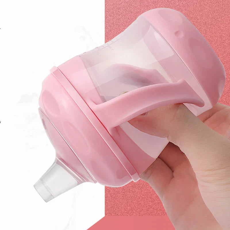 Portable baby bottle, green, easy-grip handle, perfect for on-the-go infant feeding