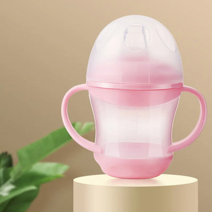 Baby essentials water bottle, clear, with a secure lid and side handle for small hands