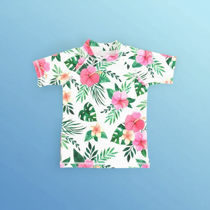 Smiling child in a colorful anti-UV swim shirt, protected and happy during sun exposure.
