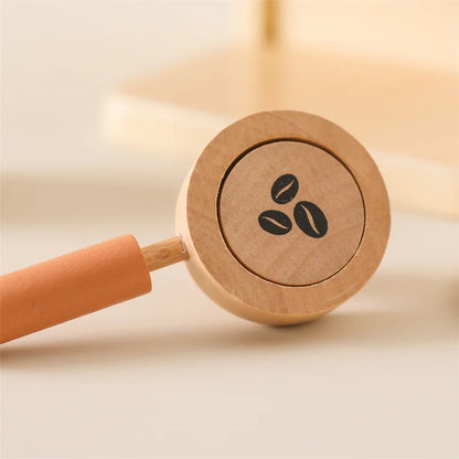 Sustainable wooden espresso machine playset for young children, encouraging imaginative coffee play.