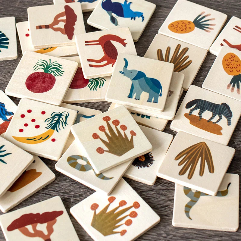Children playing wooden jungle memory game, learning animal facts and developing cognitive skills.