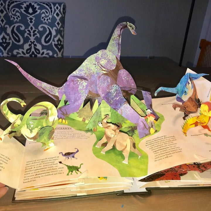 Vivid 3D pop-up dinosaurs in an immersive children's book, perfect for interactive learning & kids' activity.