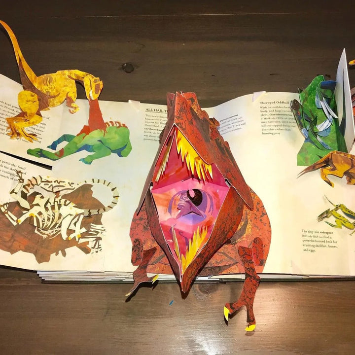 Educational 3D dinosaur pop-up book for kids, exploring natural history & prehistoric creatures interactively.